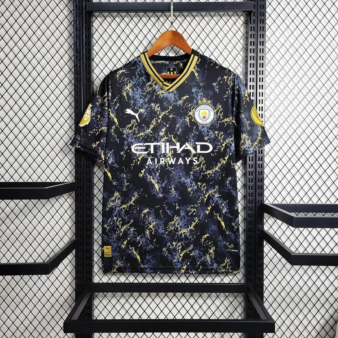 Maglia speciale nera e oro del Manchester City 23/24