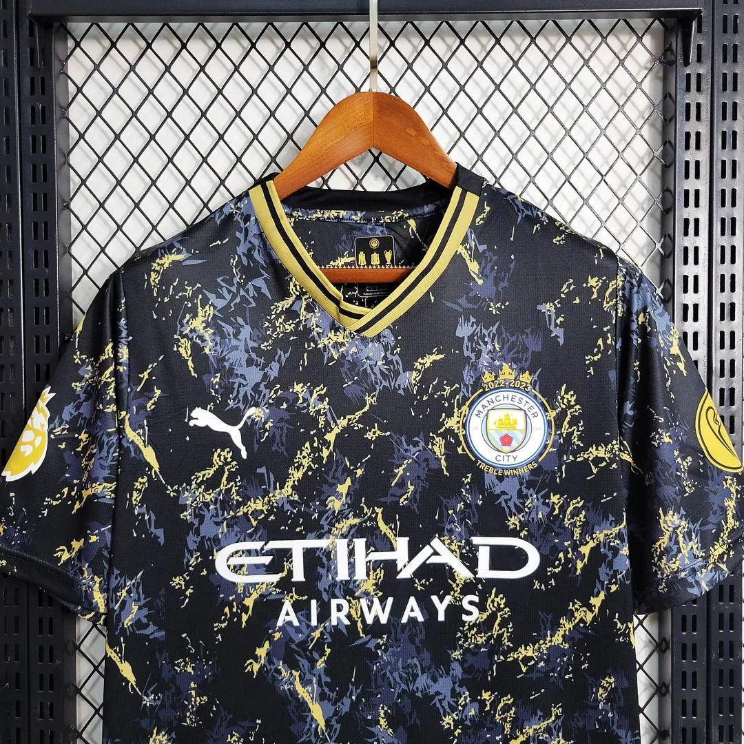 Maglia speciale nera e oro del Manchester City 23/24